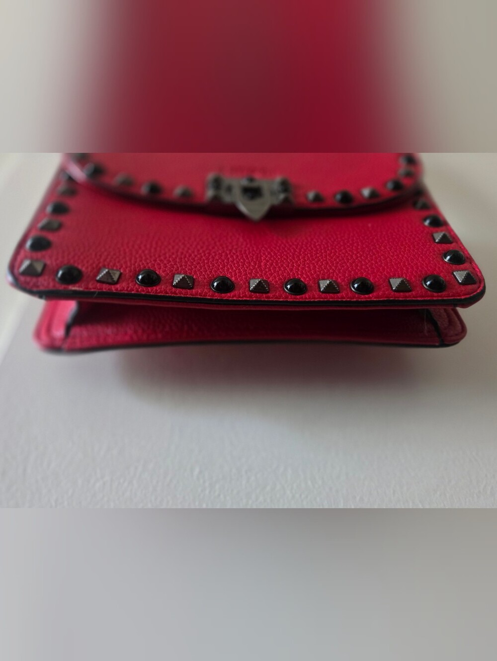 MERSI's coveted Ruby Red Studded Crossbody Bag with Multicolor Geo Strap - Picture 5 of 8